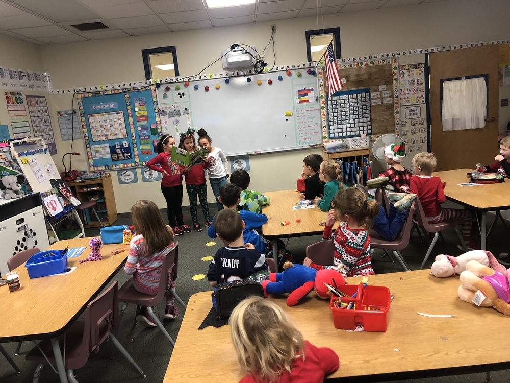Kindness Club reads holiday stories to kindergarten classes!