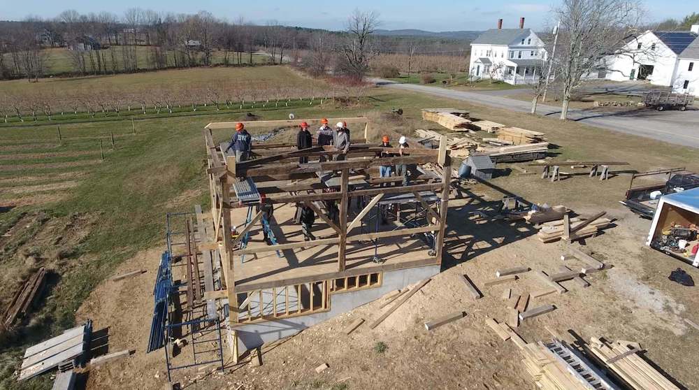 Building Trades students prepare to raise the first rafter