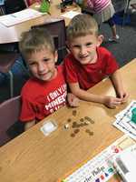 First Graders in Mrs. Giberti's Class Play the Penny Dice Game