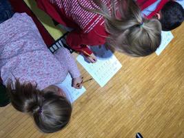 First Graders Practice Writing Music Notes