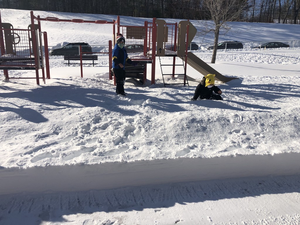 1st grade students enjoying the snow.