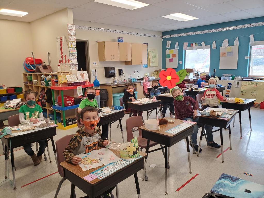 Mrs. Sturtevant's 1st graders graphing their Lucky Charms cereal.