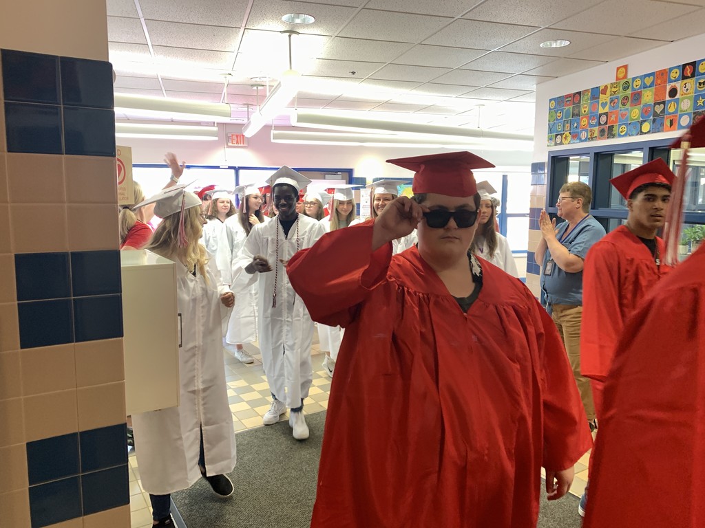 Graduating seniors received their caps and gowns this morning then walked through the middle school and all of the elementary schools this morning, with students and staff at all of the schools cheering them on. Congratulations!