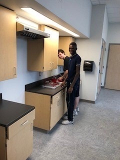 Students preparing ingredients for soup